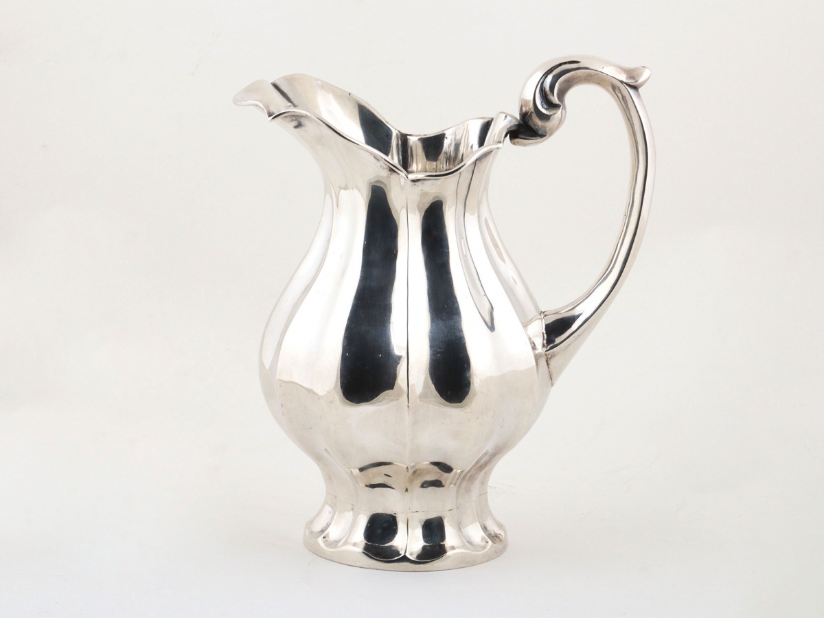 Mexican sterling silver water pitcher by the silversmith Alfredo Ortega decorated with gadroons